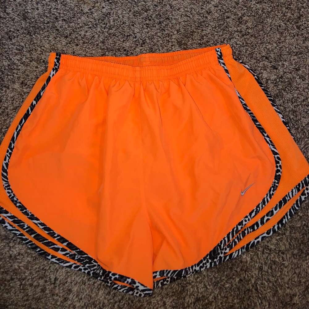Orange nike shorts with cheetah print